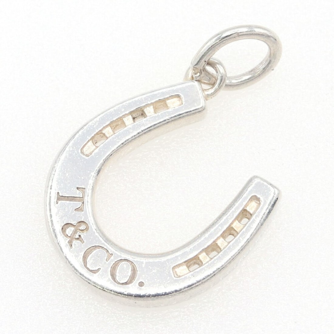 Tiffany & Co. Horseshoe Pendant Top, Sterling Silver 925, Women's, TIFFANY: --- Catalog ---Category: DesignGender: WomenMaterial: Sterling silver 925Necklace Type: PendantCategory: GeneralBrand: Tiffany--- Item List ---Section: ConditionRanking: Rank A Used - A few traces of