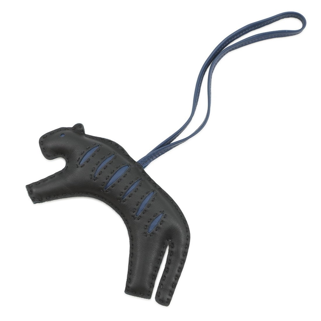 Hermès Rooroo Bag Charm in Black/Blue Saphir Lambskin. HERMES Tiger Black.: --- Catalog ---Category: SizeSize (HxWxD): 7.50mm x 14.50mm / 0.30'' x 0.57''Category: DesignType: Handbag charmColor: Black, Blue ZephyrGender: Men,WomenMaterial: LeatherCategory: GeneralBrand: Herme