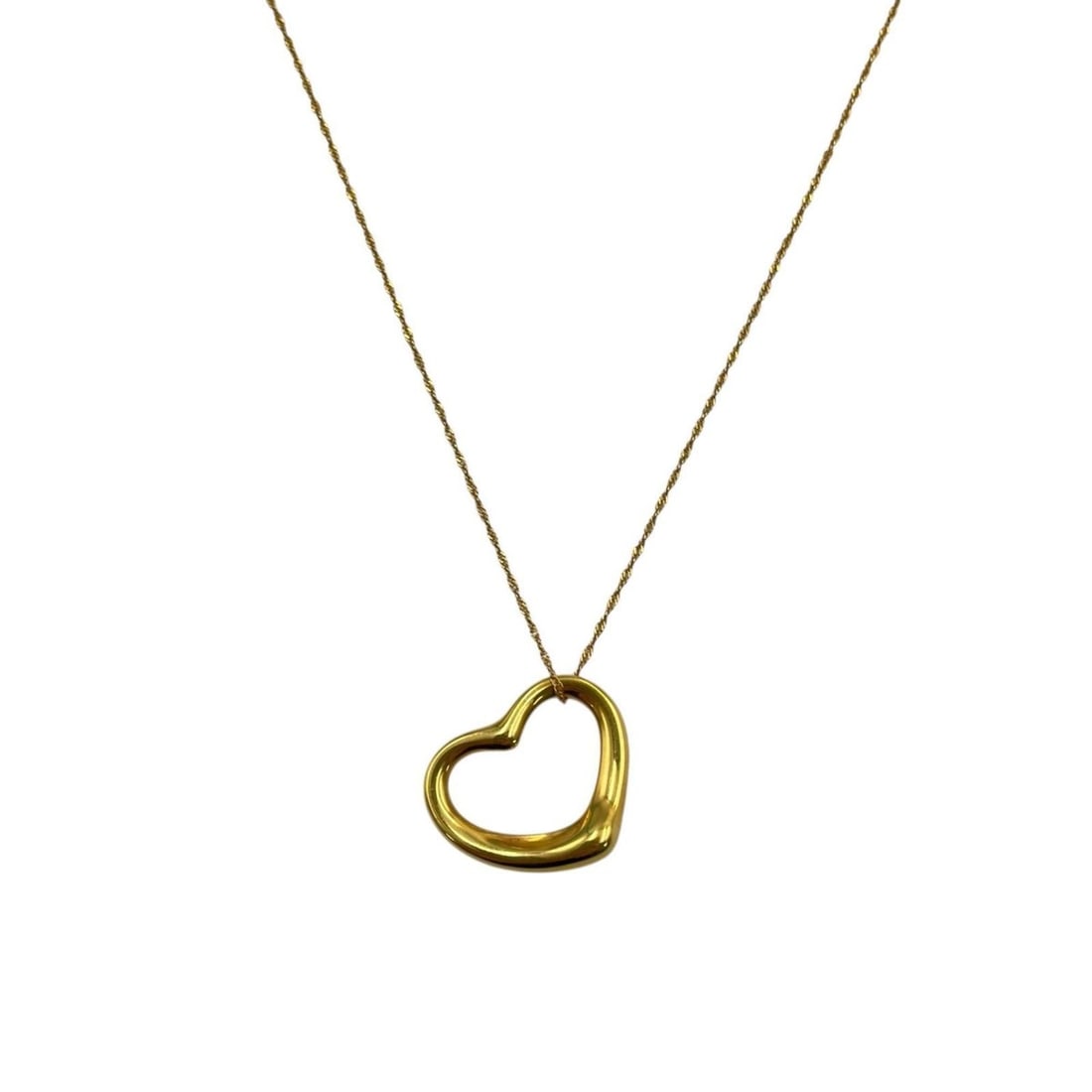 Tiffany & Co. Open Heart Necklace in 18K Yellow Gold for Women: --- Catalog ---Category: SizePendant Size: 19mm x 22mm / 0.74'' x 0.86''Neck Circumference: 40.5 cm / 15.94''Category: DesignColor: GoldGender: WomenMaterial: Yellow gold (18K)Necklace Type: NecklaceC