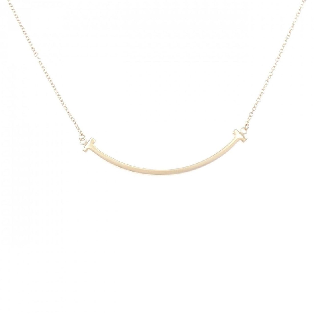 Tiffany T Smile Small Necklace: --- Catalog ---Category: SizePendant Size: 3.8mm x 36.9mm / 0.14'' x 1.45''Neck Circumference: 40 cm - 46 cm / 15.74'' - 18.11''Category: DesignGender: WomenMaterial: Pink gold (18K)Pendant Type: Pend