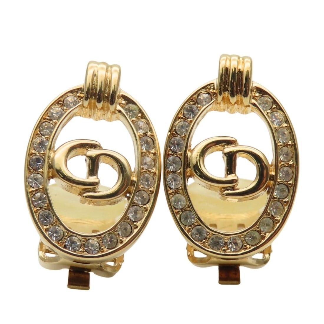 Christian Dior CD logo metal earrings with rhinestones in gold plated GP for women.: --- Catalog ---Category: SizeWeight: 7.2g / 0.25oz.Size (HxWxD): 21.50mm x 14.30mm / 0.85'' x 0.56''Category: DesignType: Clip earringsColor: GoldStone: RhinestoneGender: WomenMaterial: MetalCategory: