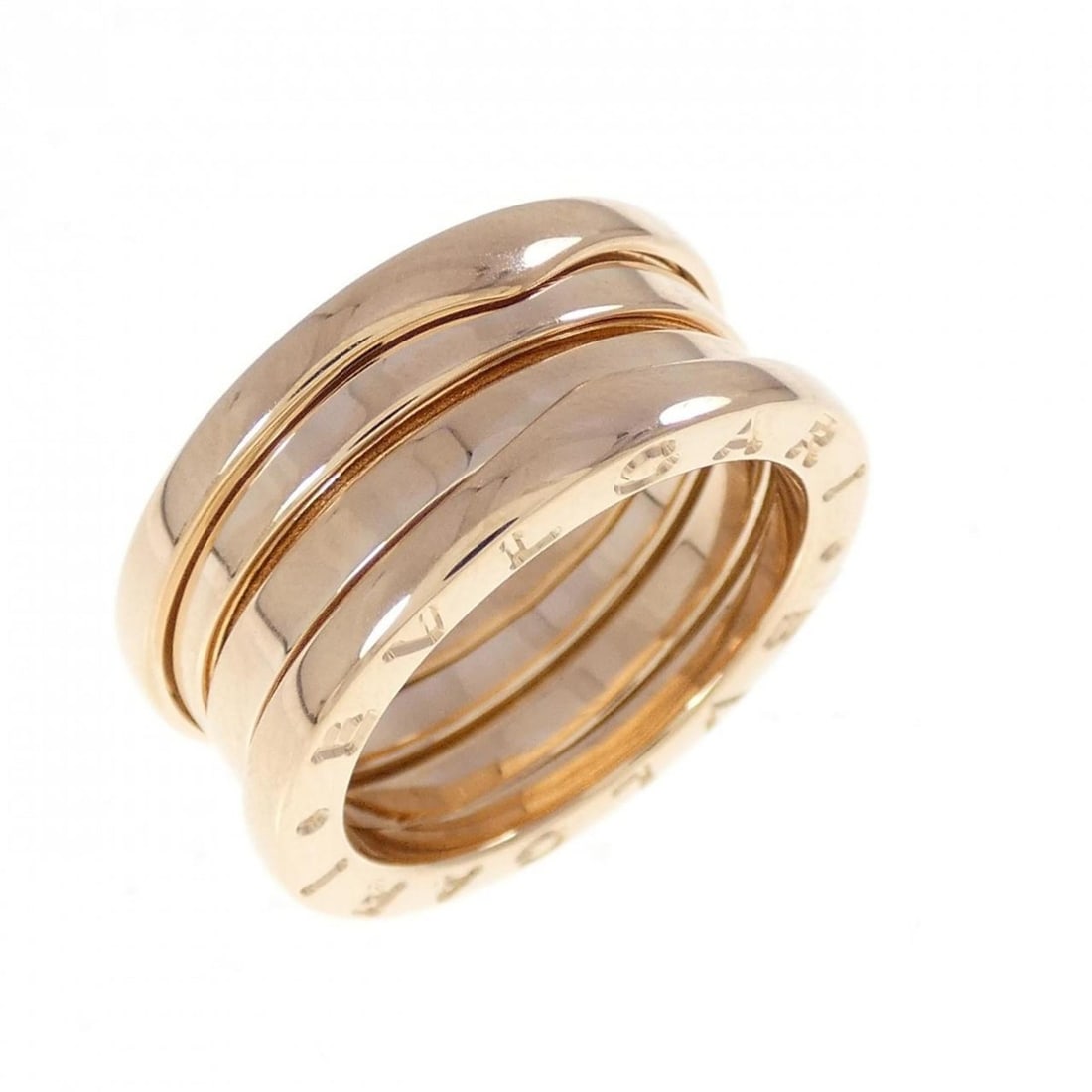Bvlgari B.zero1 3-Band Ring: --- Catalog ---Category: SizeUS Size: 6Brand Size: 51Category: DesignType: Band ringGender: WomenMaterial: Pink gold (18K)Category: GeneralMPN: AN191023Brand: Bvlgari--- Item List ---Section: Conditio