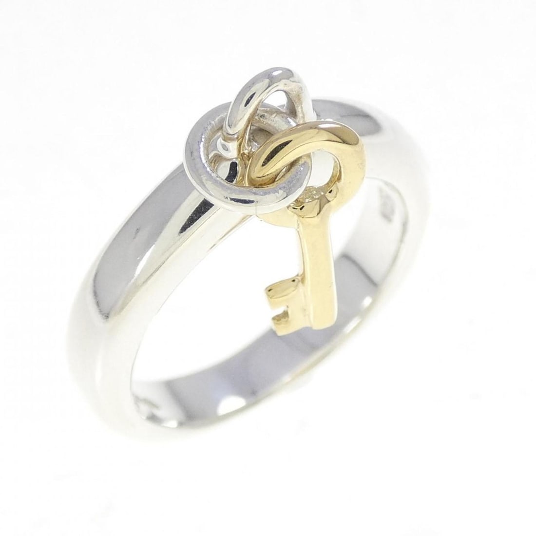 Tiffany 925 750YG Ring: --- Catalog ---Category: SizeJP Size: 10.0US Size: 5.5Category: DesignType: Band ringGender: WomenMaterial: Silver 925, Yellow gold (18K)Category: GeneralBrand: Tiffany--- Item List ---Section: Condit