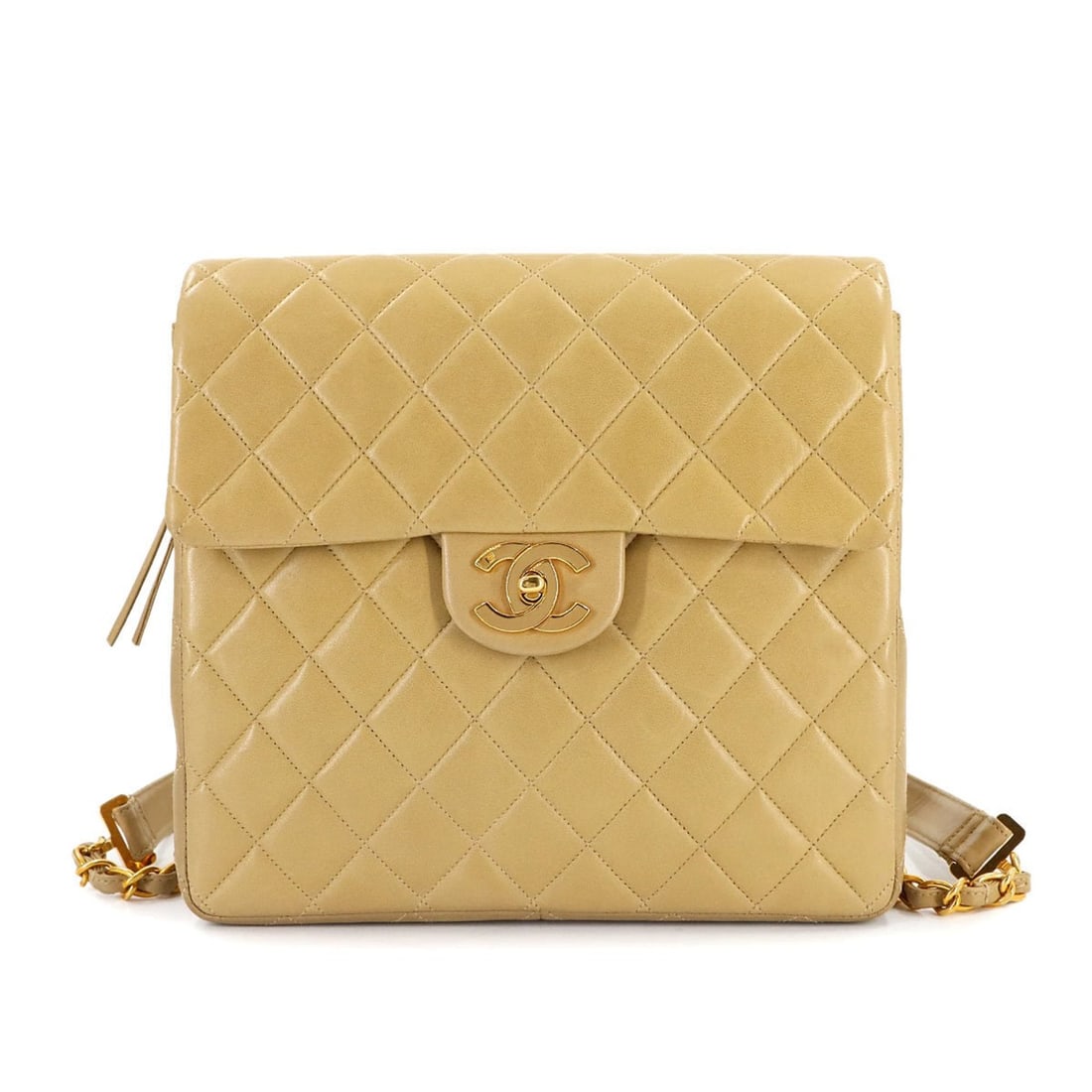 CHANEL Matelasse Chain Backpack in Beige Lambskin with Gold Hardware: --- Catalog ---Category: SizeSize (HxWxD): 23cm x 25cm x 7.5cm / 9.05'' x 9.84'' x 2.95''Category: DesignType: BackpackColor: BeigeGender: WomenMaterial: Leather Leather/Fur Type: LambskinCategory: Ge