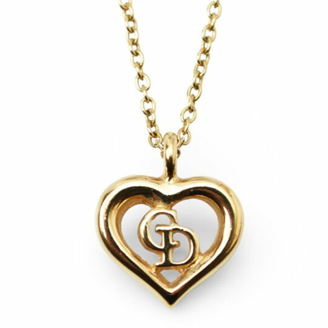 Christian Dior necklace pendant with heart motif in gold: --- Catalog ---Category: SizePendant Size: 14mm x 14mm / 0.55'' x 0.55''Neck Circumference: 38 cm - 42 cm / 14.96'' - 16.53''Category: DesignColor: GoldGender: WomenPendant Type: PendantNecklace Type: