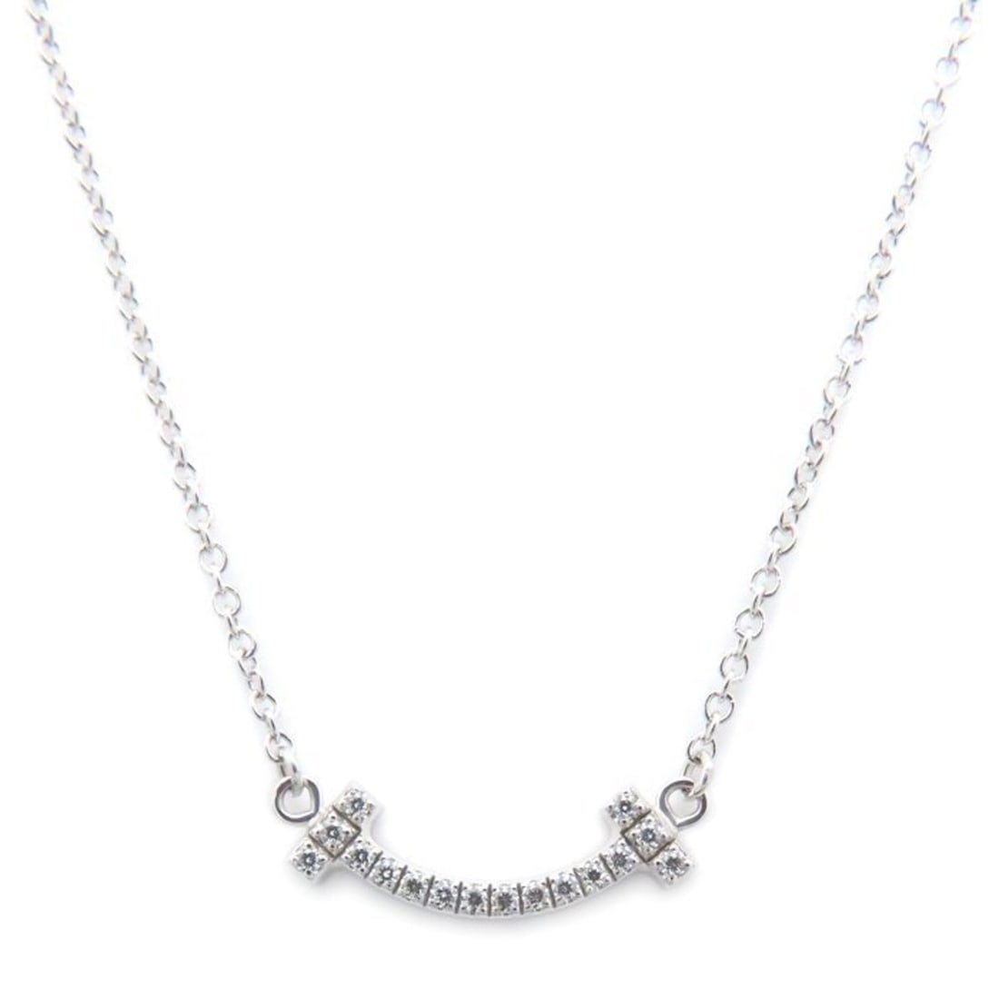 TIFFANY & Co. Tiffany T Smile Necklace, Mini Diamond, 18K White Gold, Women's, 295047: --- Catalog ---Category: SizeWeight: 2.3g / 0.08oz.Pendant Size: 3.6mm x 13.6mm / 0.14'' x 0.53''Neck Circumference: 41 cm - 46 cm / 16.14'' - 18.11''Category: DesignStone: DiamondGender: