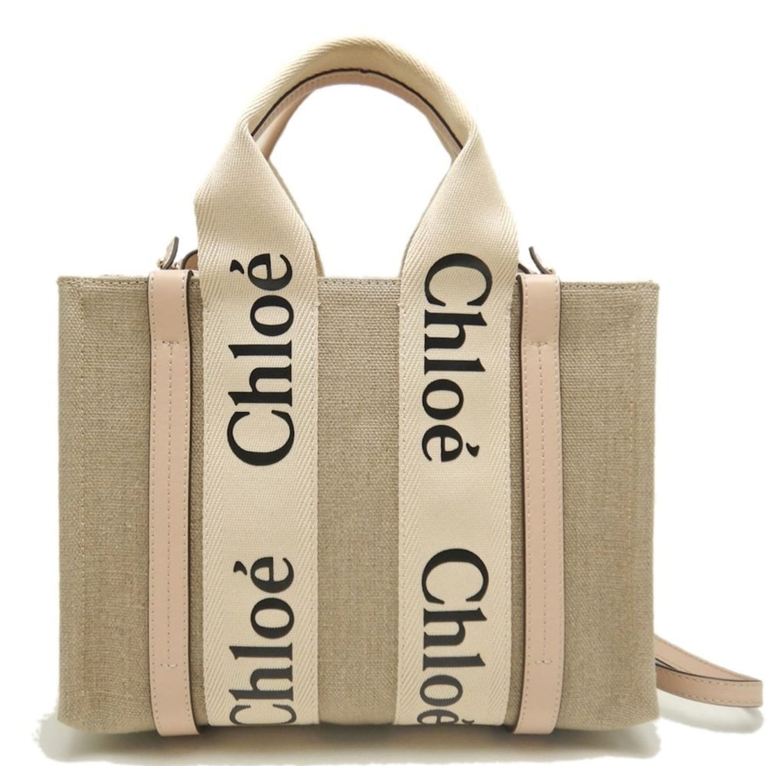 Chloé Chloe Woody Small Tote (CHC22AS397I266J5) - Linen and Calfskin Bag in Cement Pink Beige,: --- Catalog ---Category: SizeSize (HxWxD): 20cm x 26.5cm x 8cm / 7.87'' x 10.43'' x 3.14''Strap Length: 110cm - 118cm / 43.3'' - 46.45''Category: DesignType: Tote bagColor: Pink beigeGender: WomenClos