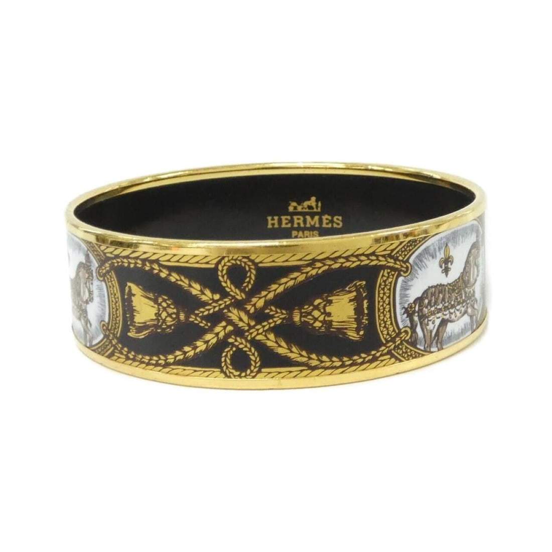 Hermes GRAND APPARAT 108004F Bangle: --- Catalog ---Category: SizeLength: 21cm / 8.26''Category: DesignType: BangleColor: Black, GoldGender: WomenCategory: GeneralMPN: 108004FBrand: Hermes--- Item List ---Section: ConditionRanking: Rank