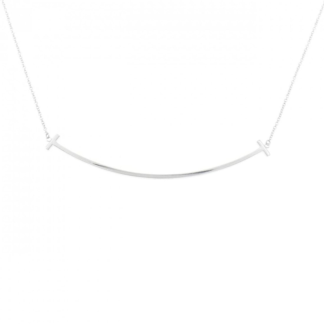 Tiffany T Smile Large Necklace: --- Catalog ---Category: SizePendant Size: 5.9mm x 68.9mm / 0.23'' x 2.71''Neck Circumference: 41 cm - 46 cm / 16.14'' - 18.11''Category: DesignGender: WomenMaterial: White gold (18K)Pendant Type: