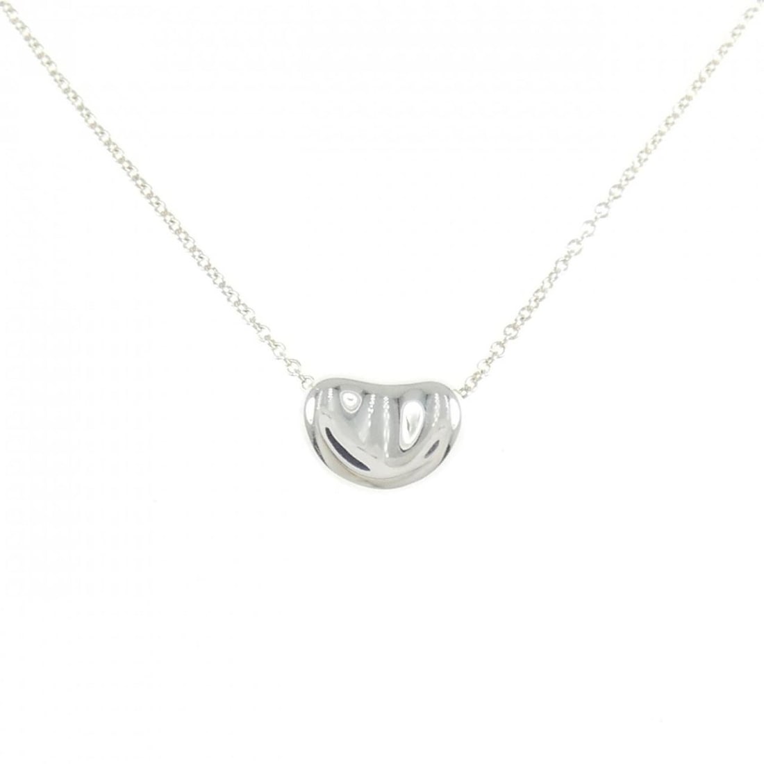 Tiffany Beans Necklace: --- Catalog ---Category: SizePendant Size: 7.8mm x 10.8mm / 0.3'' x 0.42''Neck Circumference: 40 cm / 15.74''Category: DesignColor: SilverGender: WomenMaterial: Silver 925Pendant Type: