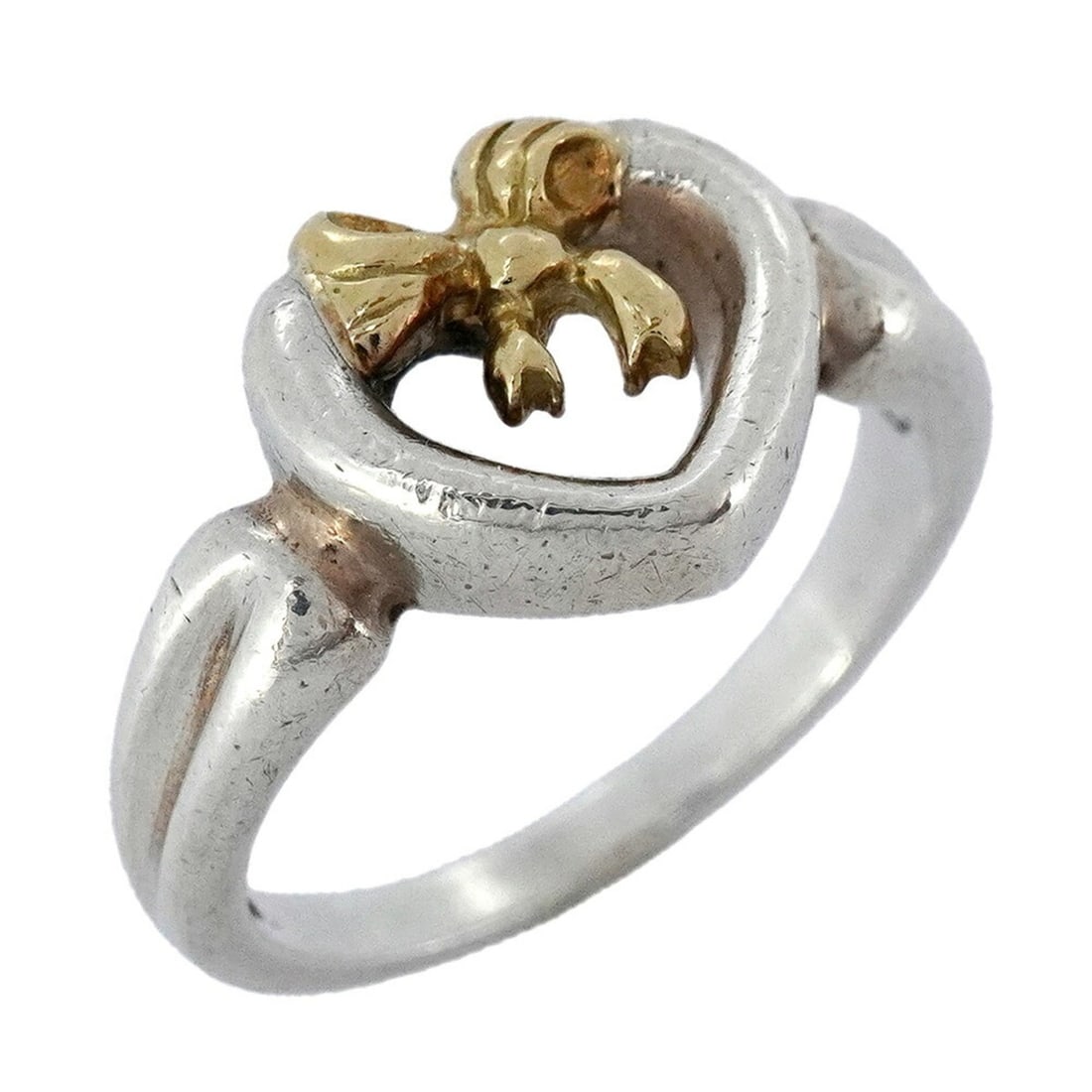 Tiffany & Co. Ribbon Heart Ring, 18K Yellow Gold and 925 Sterling Silver, Size 11.5, Women's,: --- Catalog ---Category: SizeJP Size: 11.5US Size: 6Category: DesignType: Band ringGender: WomenMaterial: Silver 925, Yellow gold (18K)Category: GeneralBrand: Tiffany--- Item List ---Section: Conditio