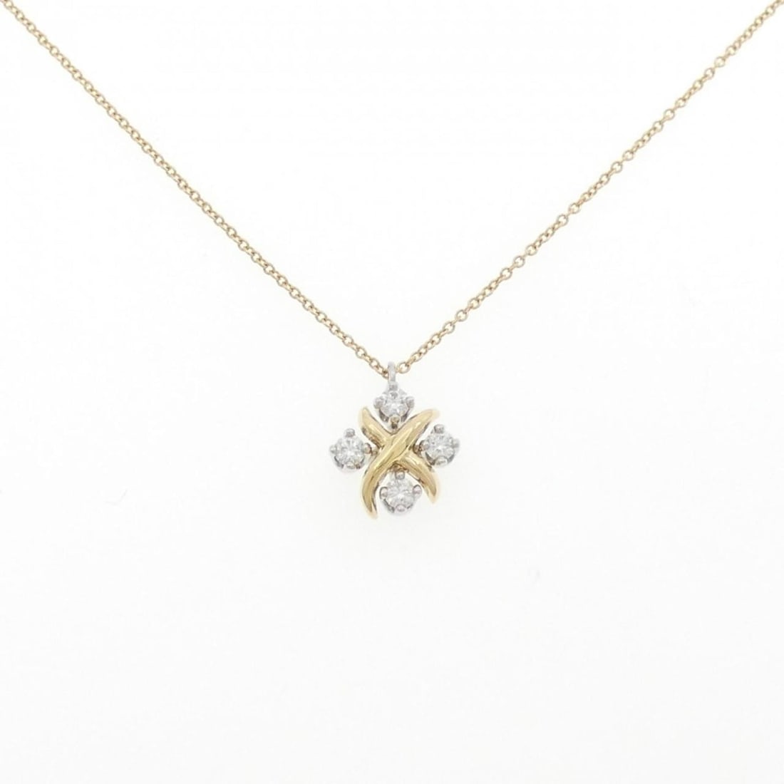 Tiffany Lynn Necklace: --- Catalog ---Category: SizePendant Size: 12.8mm x 10.3mm / 0.5'' x 0.4''Neck Circumference: 41 cm / 16.14''Category: DesignColor: GoldMaterial: Platinum 950, Yellow gold (18K)Pendant Type: