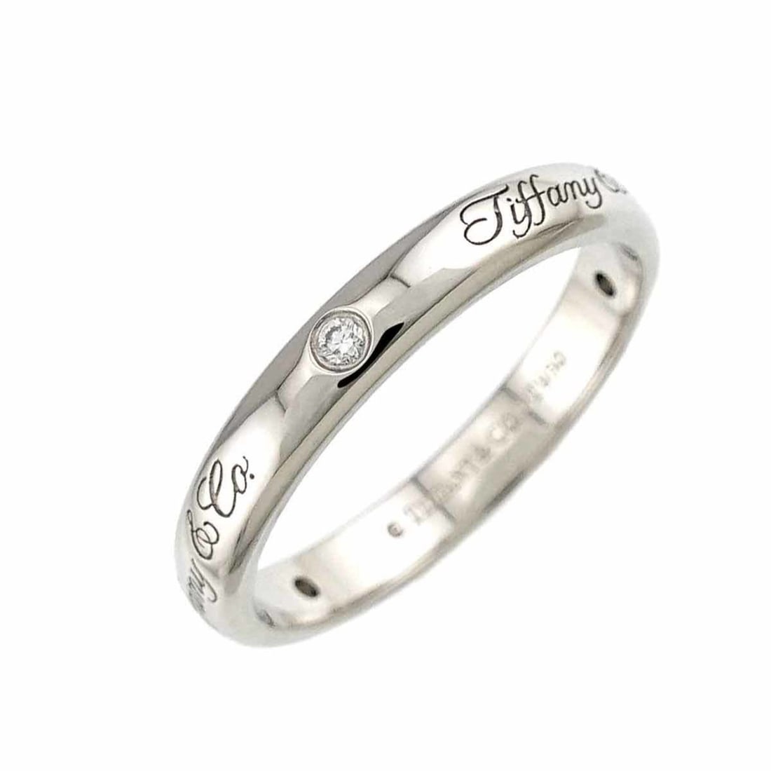 Tiffany & Co. Lucida Notes Band, size 11, platinum ring with 3 diamonds.: --- Catalog ---Category: SizeJP Size: 11US Size: 6Category: DesignType: Band ringStone: DiamondGender: WomenMaterial: Platinum 950Category: GeneralBrand: Tiffany--- Item List ---Section: ConditionRank