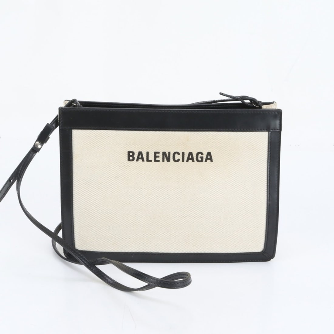 Balenciaga Navy Pochette 339937 Leather Shoulder Bag/Crossbody Bag for Women: --- Catalog ---Category: SizeSize (HxWxD): 19cm x 26cm x 5cm / 7.48'' x 10.23'' x 1.96''Category: DesignType: Pochette, Shoulder bagColor: Beige, BlackGender: WomenMaterial: Leather , Canvas Category: