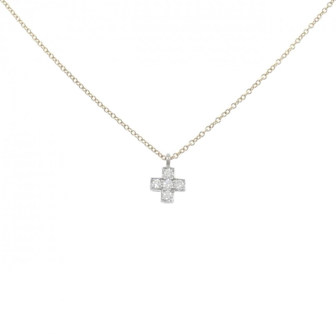 Tiffany Cruciform Necklace: --- Catalog ---Category: SizePendant Size: 9.6mm x 6.7mm / 0.37'' x 0.26''Neck Circumference: 41 cm / 16.14''Category: DesignStone: DiamondGender: WomenMaterial: Platinum 950, Yellow gold
