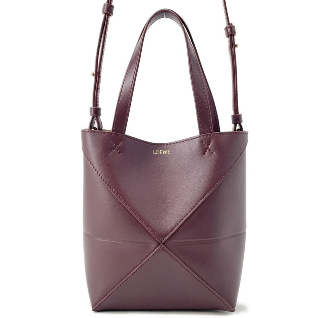 LOEWE Puzzle Fold Tote Mini Handbag A657V25X01 2-way: --- Catalog ---Category: SizeSize (HxWxD): 20cm x 15.5cm x 9cm / 7.87'' x 6.1'' x 3.54''Category: DesignType: HandbagColor: BordeauxGender: WomenMaterial: Leather Category: GeneralBrand: LoeweCountry