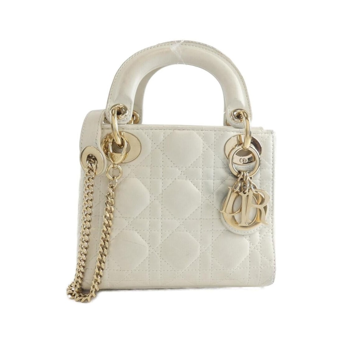 Christian Dior Lady handbag: --- Catalog ---Category: SizeSize (HxWxD): 15cm x 17cm x 7cm / 5.9'' x 6.69'' x 2.75''Category: DesignType: HandbagColor: WhiteGender: WomenMaterial: Leather Hardware Color: SilverCategory: GeneralBra