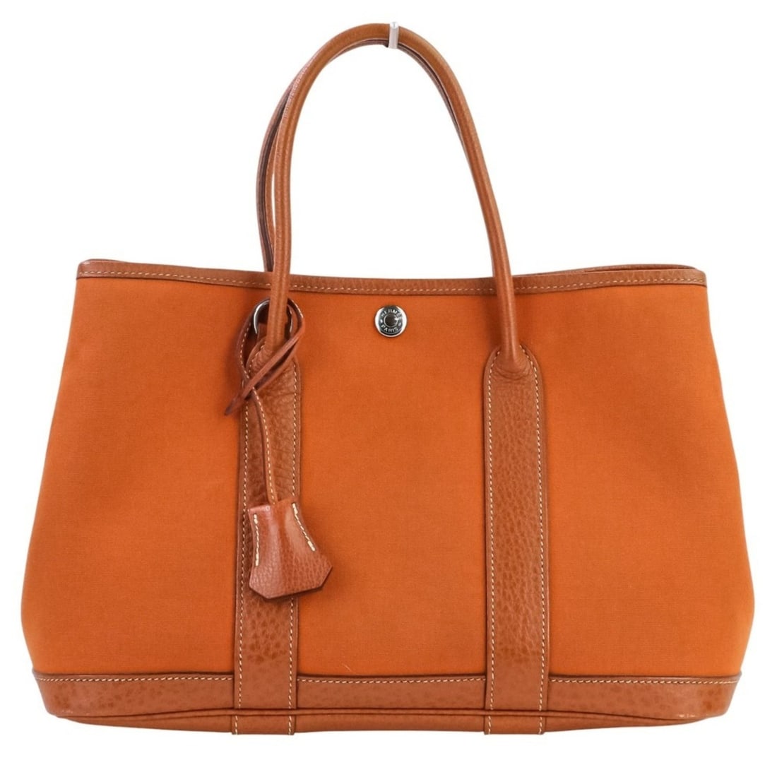 Hermes Hermès Garden Party TPM Toile Officier x Negonda Tote Bag, Potiron Orange, ?I Stamp,: --- Catalog ---Category: SizeSize (HxWxD): 21cm x 33cm x 14.5cm / 8.26'' x 12.99'' x 5.7''Category: DesignType: Tote bagColor: Orange, PotironGender: WomenMaterial: Toile officier , Negonda leather Ca