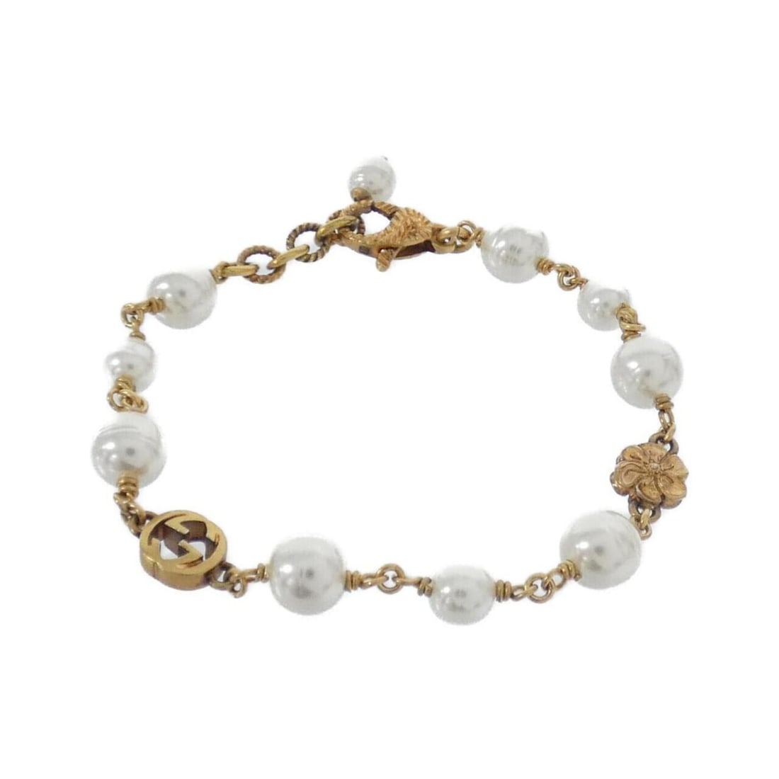 Gucci 664352 I4620 Bracelet: --- Catalog ---Category: SizeLength: 18cm - 20cm / 7.08'' - 7.87''Category: DesignType: Charm braceletColor: Gold, WhiteGender: WomenCategory: GeneralMPN: 664352 I4620Brand: Gucci--- Item List ---Sect
