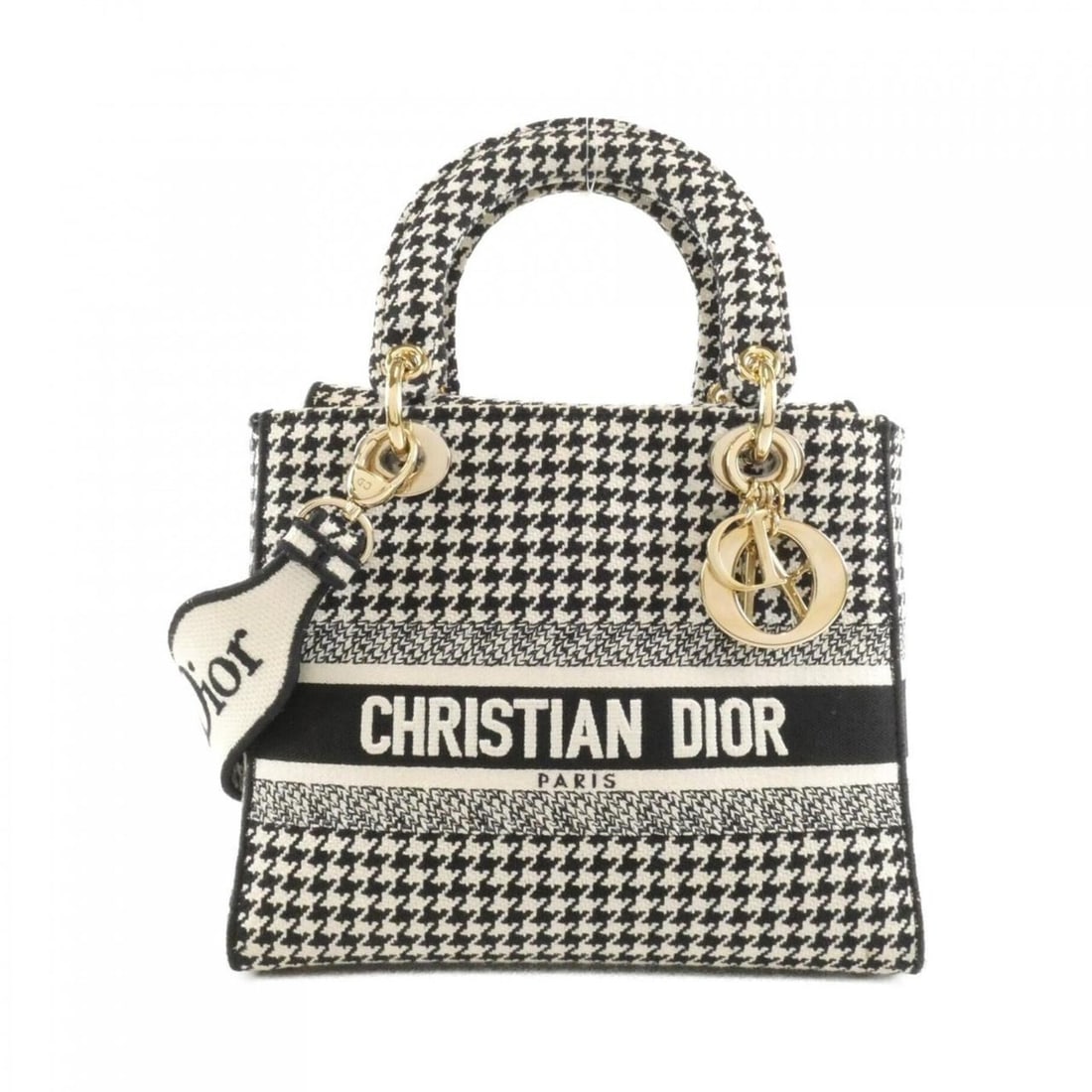 Christian Dior Lady D-Light Medium M0565OZAE Handbag: --- Catalog ---Category: SizeSize (HxWxD): 20cm x 24cm x 12cm / 7.87'' x 9.44'' x 4.72''Category: DesignType: HandbagColor: Black, WhiteGender: WomenMaterial: Canvas Hardware Color: GoldCategory:
