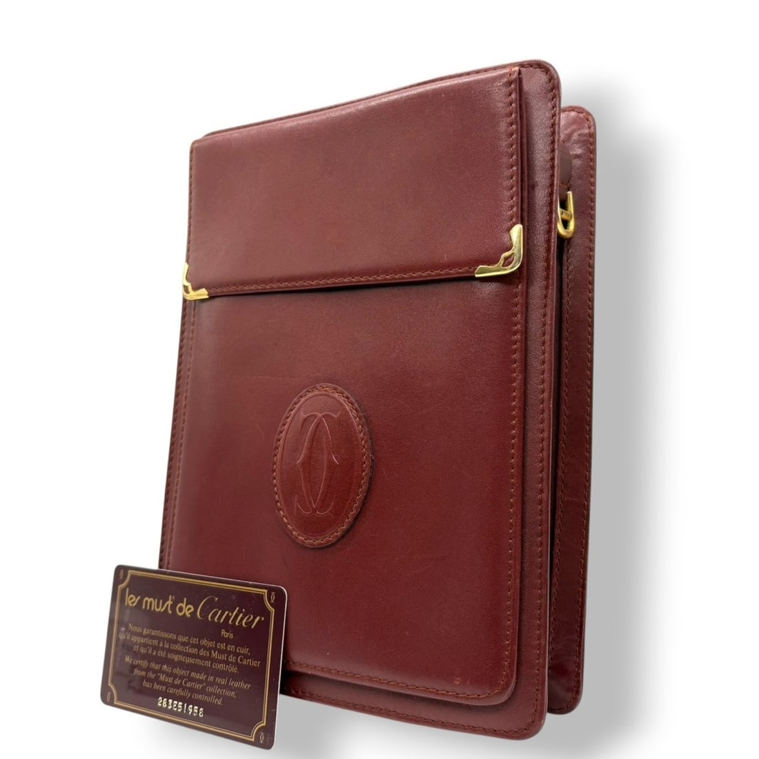 Cartier Must Line Clutch Bag, Bordeaux and Wine Red Leather with Gold Hardware, Men's Women's: --- Catalog ---Category: SizeSize (HxWxD): 21cm x 15cm x 3cm / 8.26'' x 5.9'' x 1.18''Category: DesignType: Clutch bag, PouchColor: BordeauxGender: Men,WomenMaterial: Leather Category: GeneralMPN: 283