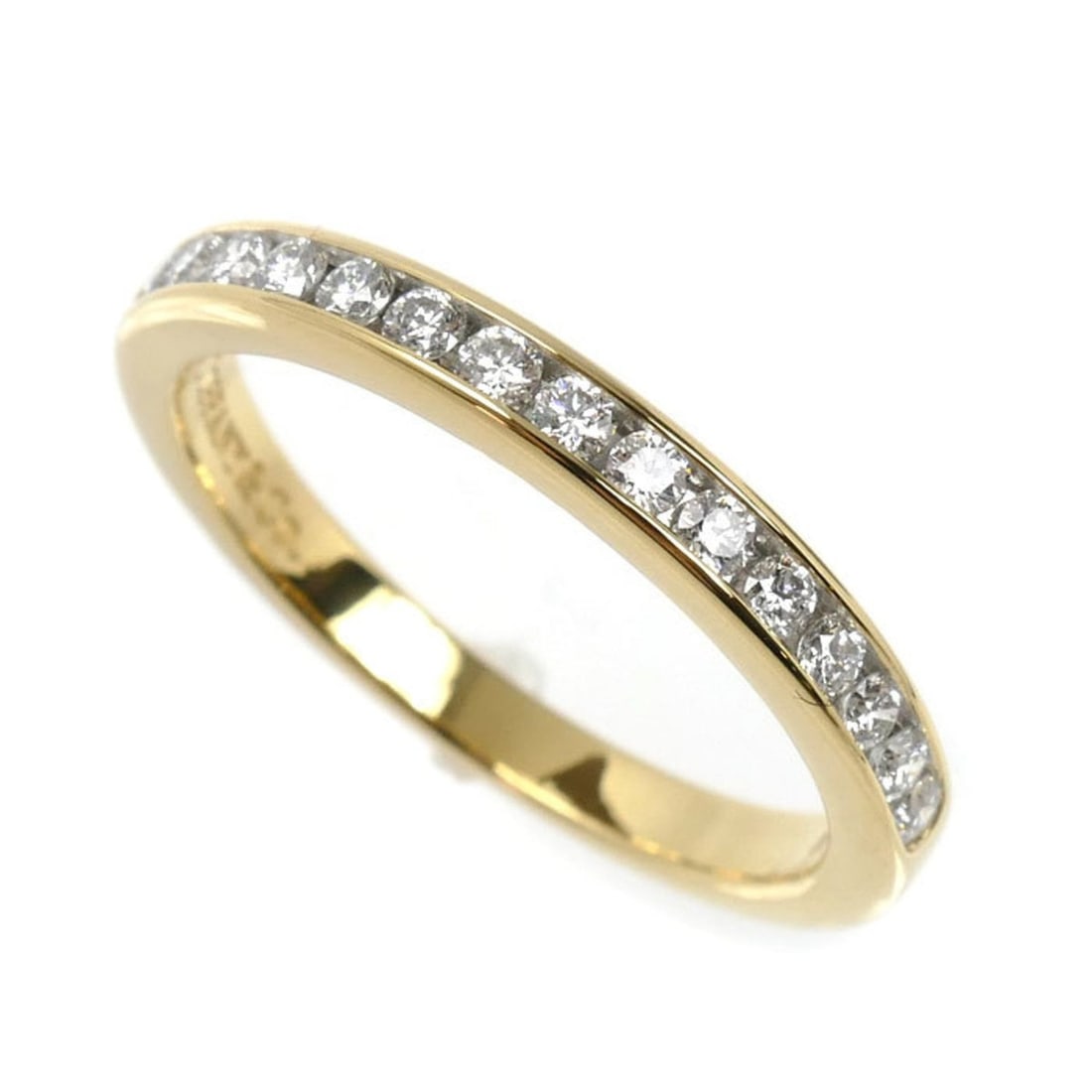TIFFANY & Co. 18K Yellow Gold Half Circle Channel Setting Ring with Diamonds, 1.3g, Women's: --- Catalog ---Category: SizeUS Size: 6Brand Size: 51.5Category: DesignType: Band ringStone: DiamondGender: WomenMaterial: Yellow gold (18K)Category: GeneralBrand: TiffanyCountry of Origin: USA--- Ite