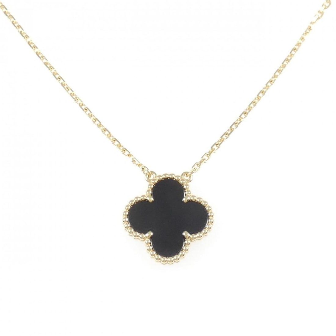 Van Cleef & Arpels Vintage Alhambra Necklace: --- Catalog ---Category: SizePendant Size: 14.9mm x 14.9mm / 0.58'' x 0.58''Neck Circumference: 37 cm - 42 cm / 14.56'' - 16.53''Category: DesignStone: OnyxGender: WomenMaterial: Yellow gold