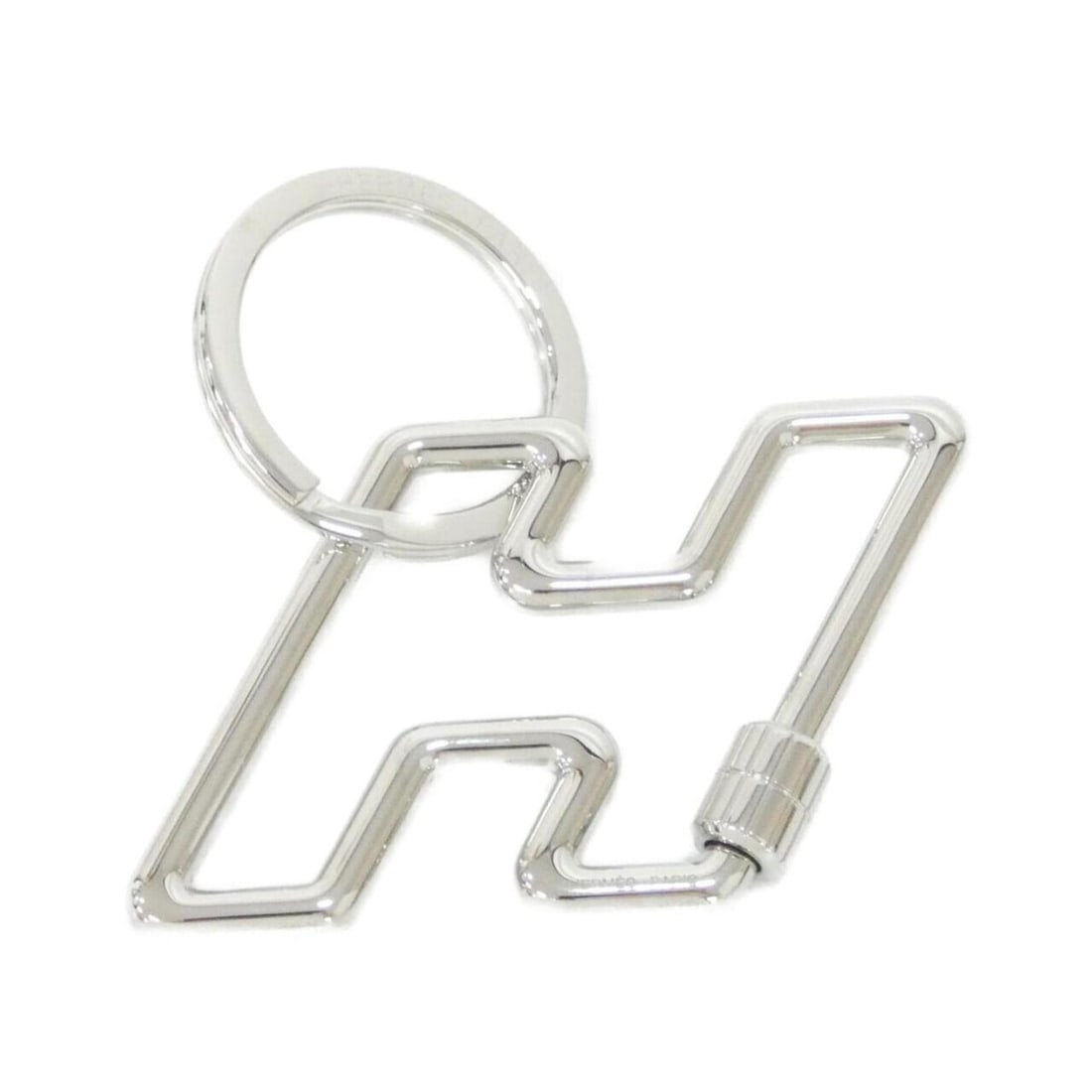 Hermes Hermès Ash to Speed 077245FJ Key Ring: --- Catalog ---Category: DesignType: KeyringColor: SilverGender: Men,WomenMaterial: Stainless steelCategory: GeneralMPN: 077245FJBrand: Hermes--- Item List ---Section: ConditionRanking: Rank A Used -