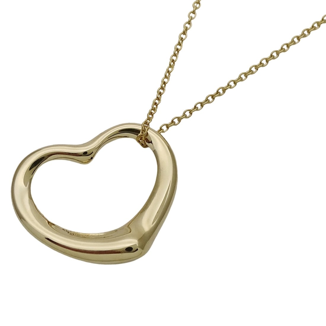 Tiffany & Co. Women's Elsa Peretti Open Heart Necklace in 750YG Yellow Gold, Polished: --- Catalog ---Category: SizeWeight: 5.5g / 0.19oz.Pendant Size: 18.1mm x 21.5mm / 0.71'' x 0.84''Neck Circumference: 41 cm / 16.14''Category: DesignColor: YellowMetal: GoldGender: WomenMetal Purity: