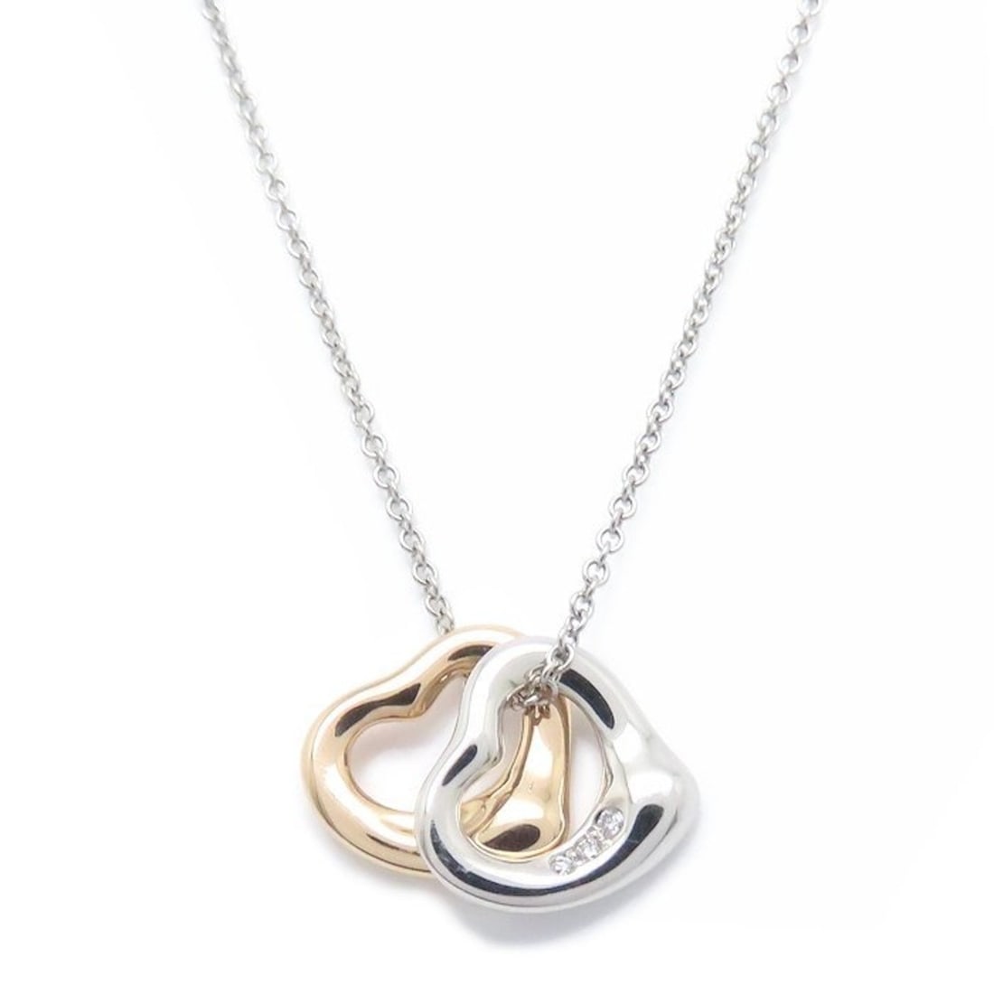 TIFFANY & Co. Elsa Peretti Double Heart Necklace with Diamonds, Pt950 Platinum and 18K Gold,: --- Catalog ---Category: SizeWeight: 5g / 0.17oz.Pendant Size: 10mm x 11mm / 0.39'' x 0.43''Neck Circumference: 40.5 cm / 15.94''Category: DesignStone: DiamondGender: WomenMaterial: Platinum 950, Rose