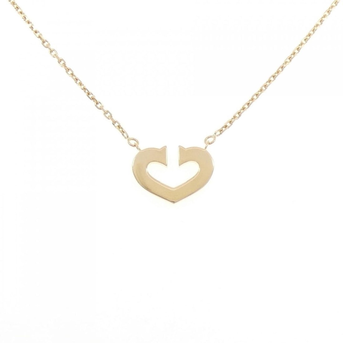 Cartier C Heart Necklace: --- Catalog ---Category: SizePendant Size: 12.1mm x 16.5mm / 0.47'' x 0.64''Neck Circumference: 41 cm / 16.14''Category: DesignColor: Yellow goldGender: WomenMaterial: Yellow gold (18K)Pendant Type: