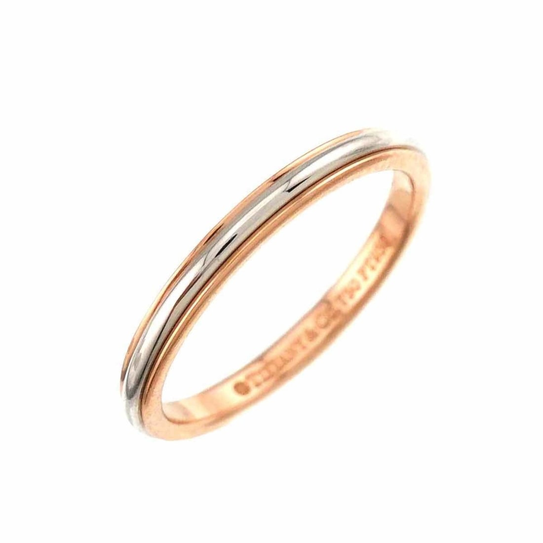Tiffany & Co. Size 6.5 Ring in Platinum, 18K Pink Gold, and PG 750: --- Catalog ---Category: SizeJP Size: 6.5US Size: 3.5Category: DesignType: Band ringGender: WomenMaterial: Pink gold (18K), Platinum 950Category: GeneralBrand: Tiffany--- Item List ---Section: