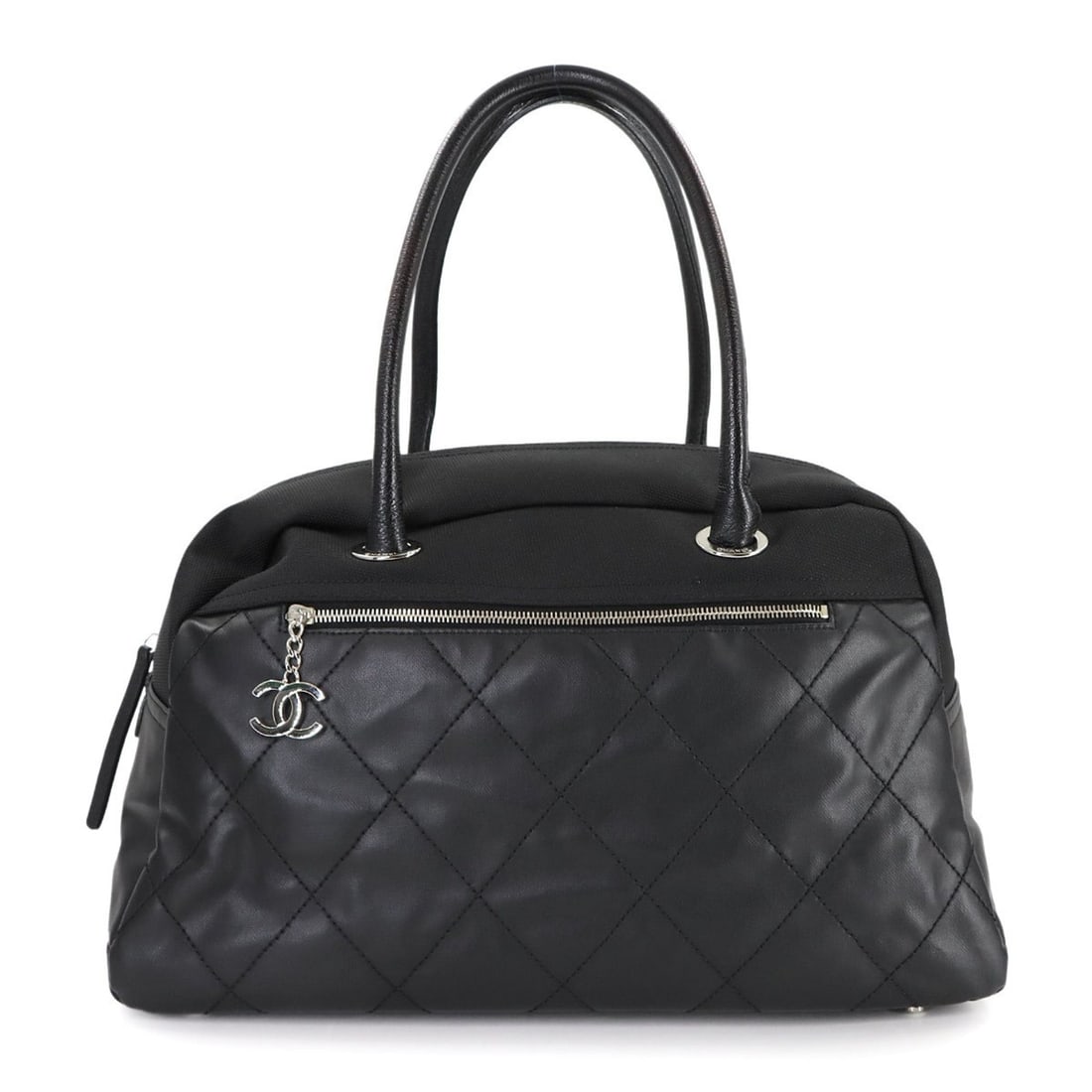 CHANEL Paris Biarritz Boston Handbag in Black Nylon and Leather: --- Catalog ---Category: SizeSize (HxWxD): 24cm x 42cm x 23cm / 9.44'' x 16.53'' x 9.05''Category: DesignType: Boston bag, HandbagColor: BlackGender: WomenMaterial: Nylon , PVC , Leather Category: Gen