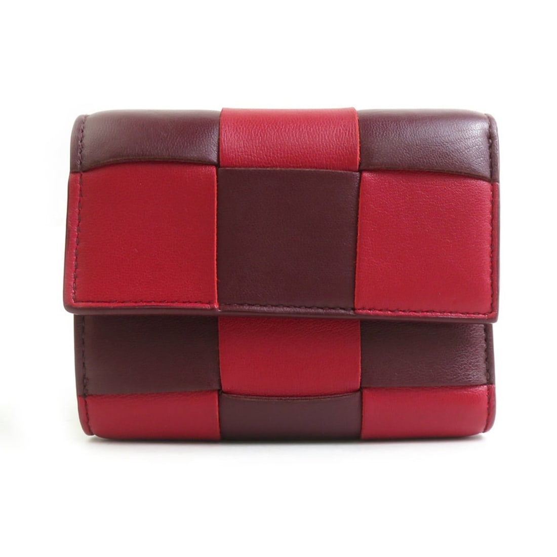 Bottega Veneta Women's Tri-fold Leather Wallet in Red and Bordeaux (r11003a): --- Catalog ---Category: SizeSize (HxWxD): 9cm x 11.5cm x 3cm / 3.54'' x 4.52'' x 1.18''Category: DesignType: Wallet (tri-fold)Color: Bordeaux, Red colorGender: WomenMaterial: Leather Category: Genera
