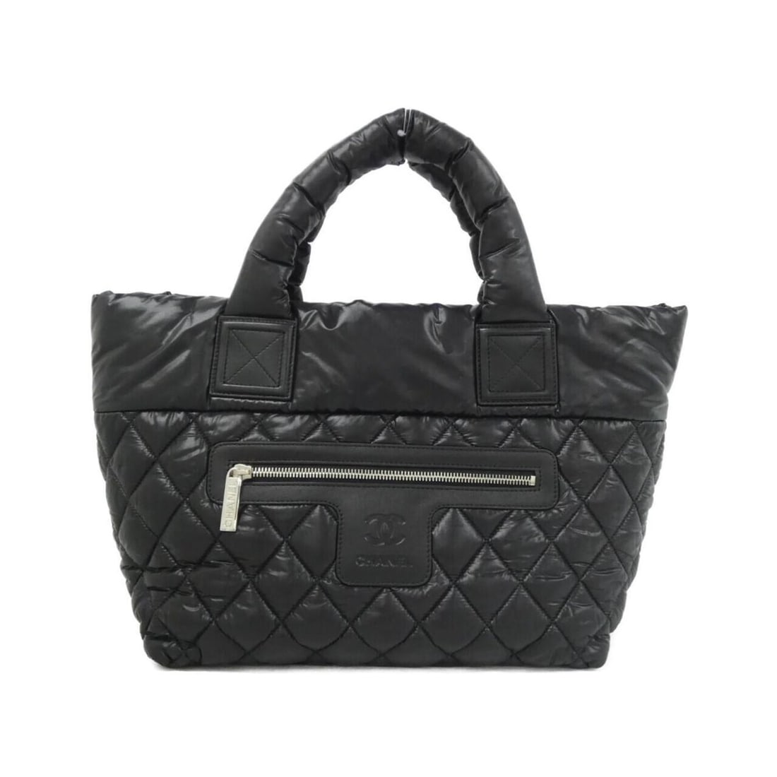 Chanel Coco Cocoon Line 48610 Handbag: --- Catalog ---Category: SizeSize (HxWxD): 24cm x 42cm x 15cm / 9.44'' x 16.53'' x 5.9''Category: DesignType: HandbagColor: BlackGender: WomenMaterial: Nylon Hardware Color: SilverCategory: