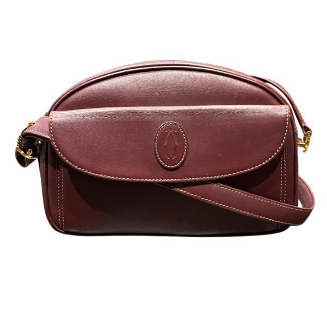 Cartier Must Line Bag Shoulder for Women: --- Catalog ---Category: SizeSize (HxWxD): 18cm x 23cm x 5cm / 7.08'' x 9.05'' x 1.96''Category: DesignType: Shoulder bagColor: BordeauxGender: WomenMaterial: Leather Category: GeneralBrand: Cartier--