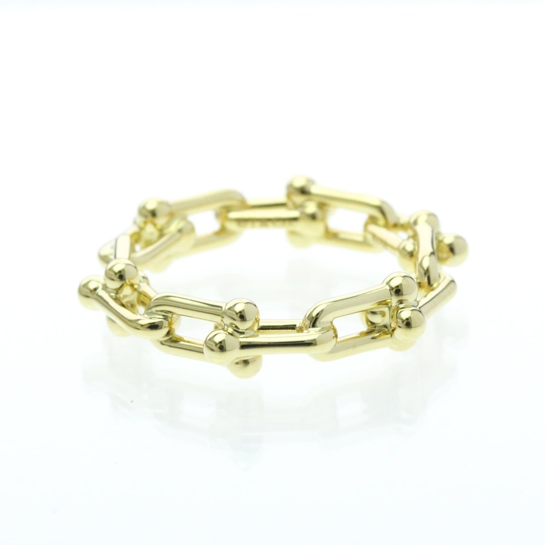 Tiffany Hardware Micro Link Ring Yellow Gold (18K) Fashion No Stone Band Ring Gold: --- Catalog ---Category: SizeWidth: 5mm / 0.2''Weight: 5.4g / 0.19oz.JP Size: 10US Size: 5.5Category: DesignType: Band ringColor: GoldMetal: GoldStone: No StoneStyle: FashionGender: Men,WomenMaterial: