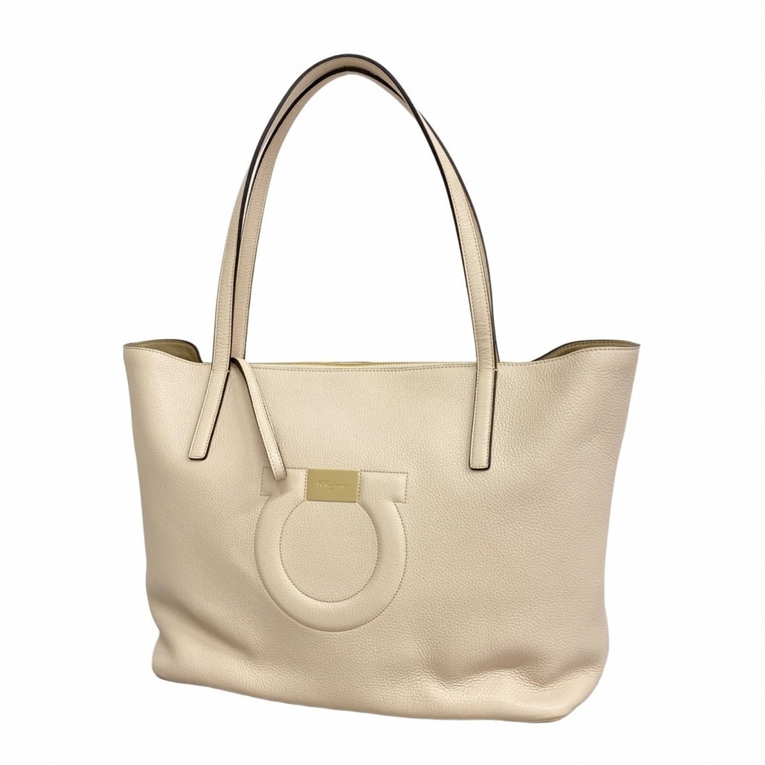 Salvatore Ferragamo Gancini Leather Tote Bag in Beige Champagne for Women: --- Catalog ---Category: SizeSize (HxWxD): 29cm x 34.5cm x 16cm / 11.41'' x 13.58'' x 6.29''Category: DesignType: Tote bagColor: BeigeGender: WomenMaterial: Leather Hardware Color: Champagne goldCateg
