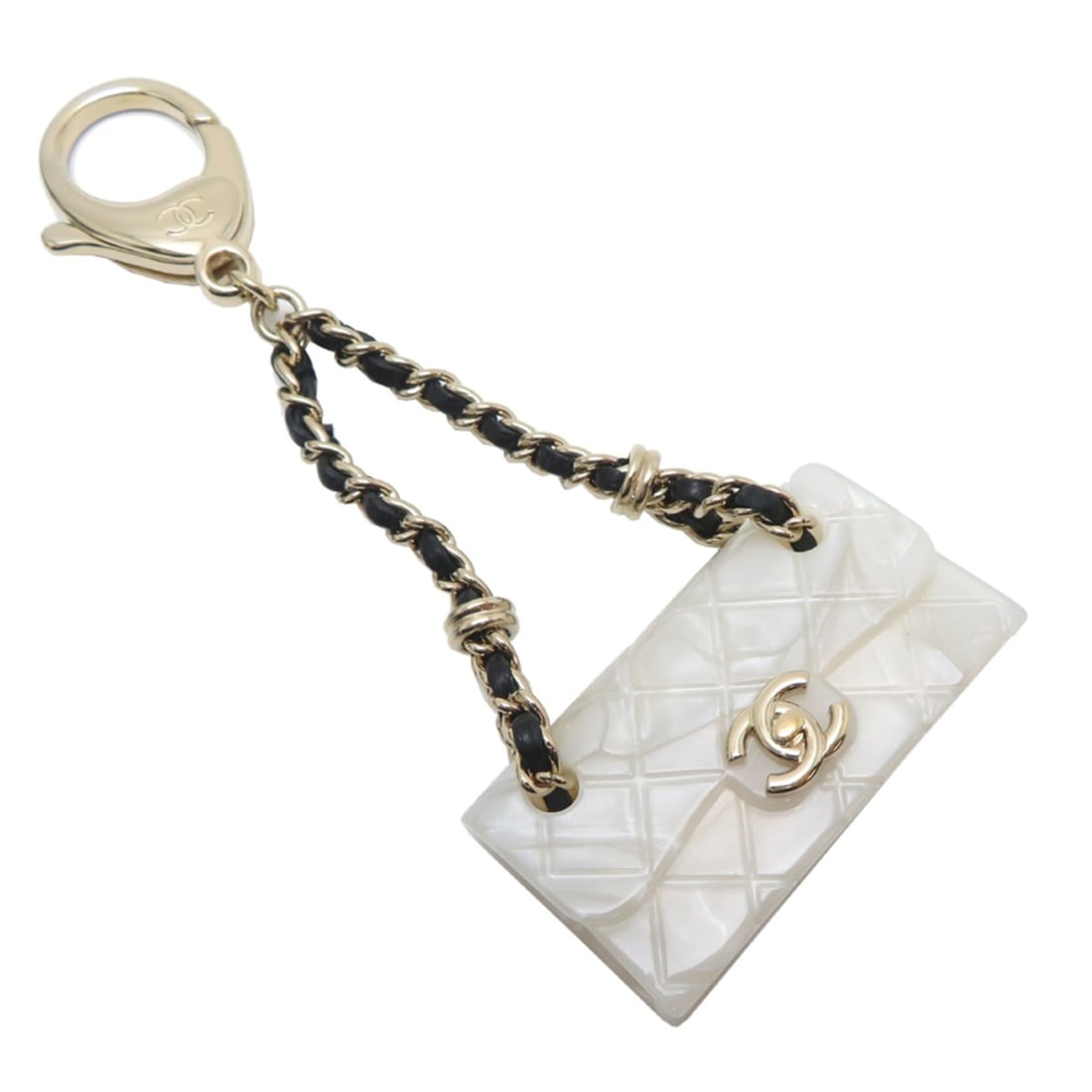 Chanel Matelasse Bag Charm for Women, GP, White: --- Catalog ---Category: SizeSize (HxWxD): 40.00mm x 100.00mm / 1.57'' x 3.94''Category: DesignType: Handbag charmColor: WhiteGender: WomenMaterial: Gold platingCategory: GeneralBrand: Chanel--- Item