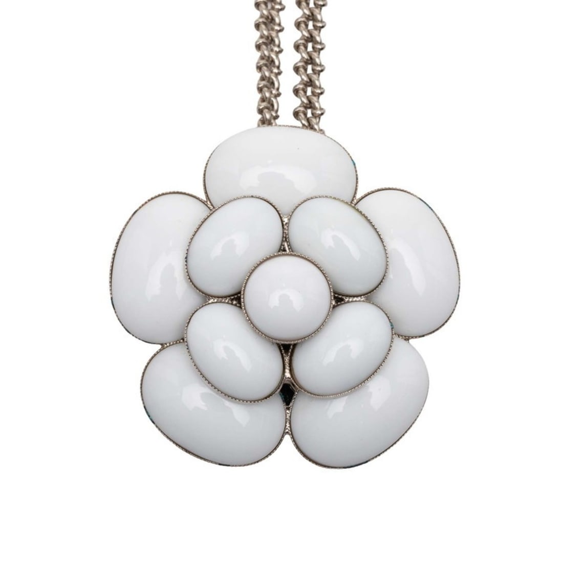 CHANEL Camellia Cruise Line Pendant Necklace in White and Silver Metal for Women: --- Catalog ---Category: SizePendant Size: 56mm x 57.7mm / 2.2'' x 2.27''Neck Circumference: 47.8 cm / 18.81''Category: DesignColor: Silver, WhiteGender: WomenSeason: CruiseMaterial: MetalPendant Type