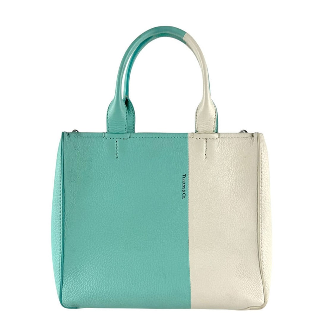Tiffany & Co. Women's Leather Handbag Shoulder Bag in Blue-Green and White (z8575): --- Catalog ---Category: SizeSize (HxWxD): 17cm x 20cm x 9cm / 6.69'' x 7.87'' x 3.54''Category: DesignType: Handbag, Shoulder bagColor: Blue green, WhiteGender: WomenMaterial: Leather Category: