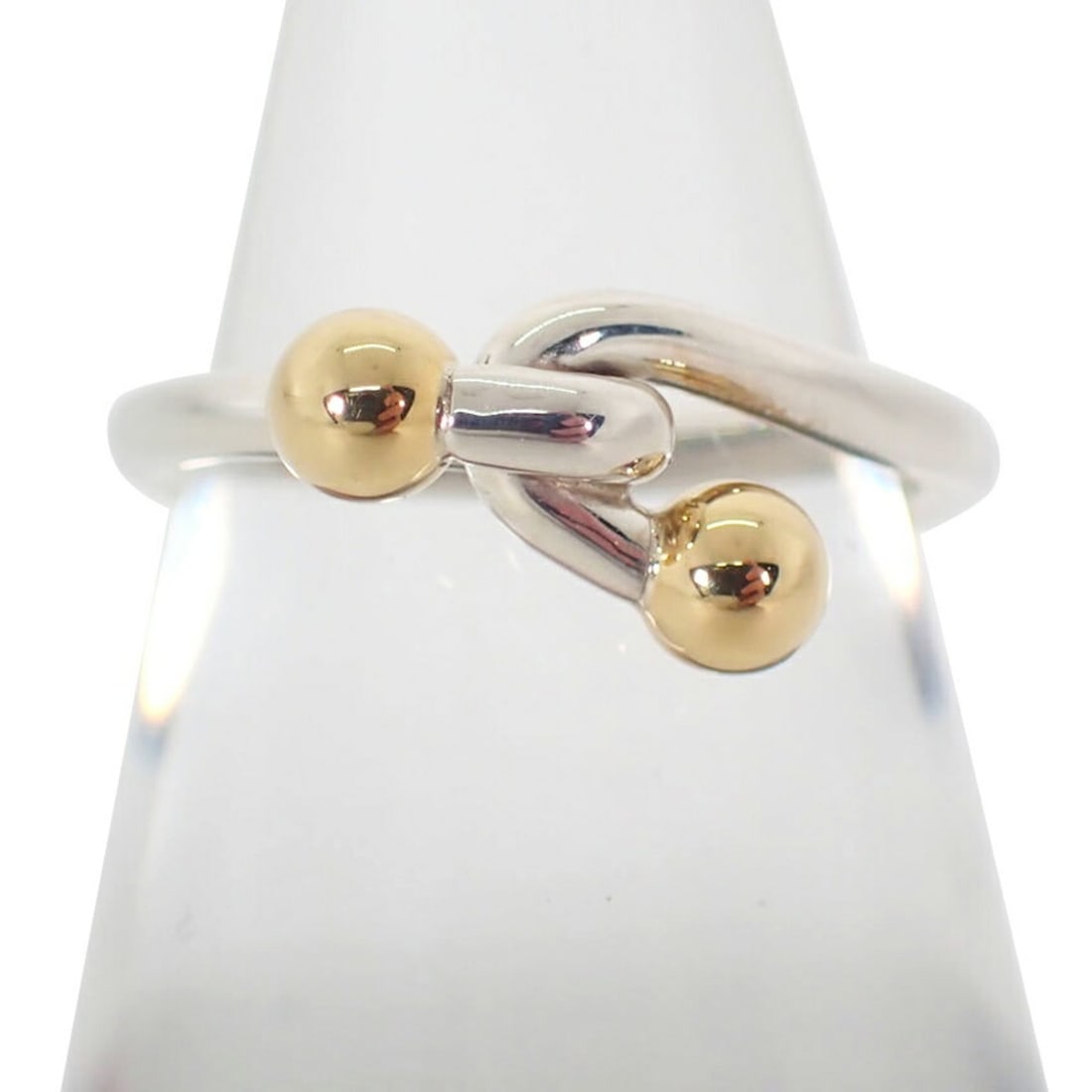 TIFFANY 925 750 Love Knot Ring, size 9.5: --- Catalog ---Category: SizeUS Size: 5Brand Size: 49Category: DesignType: Band ringGender: WomenMaterial: Sterling silver 925, Yellow gold (18K)Category: GeneralBrand: Tiffany--- Item List ---Section