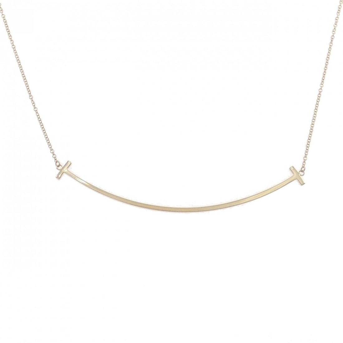 Tiffany T Smile Large Necklace: --- Catalog ---Category: SizePendant Size: 6mm x 68.7mm / 0.23'' x 2.7''Neck Circumference: 41 cm - 46 cm / 16.14'' - 18.11''Category: DesignGender: WomenMaterial: Pink gold (18K)Pendant Type:
