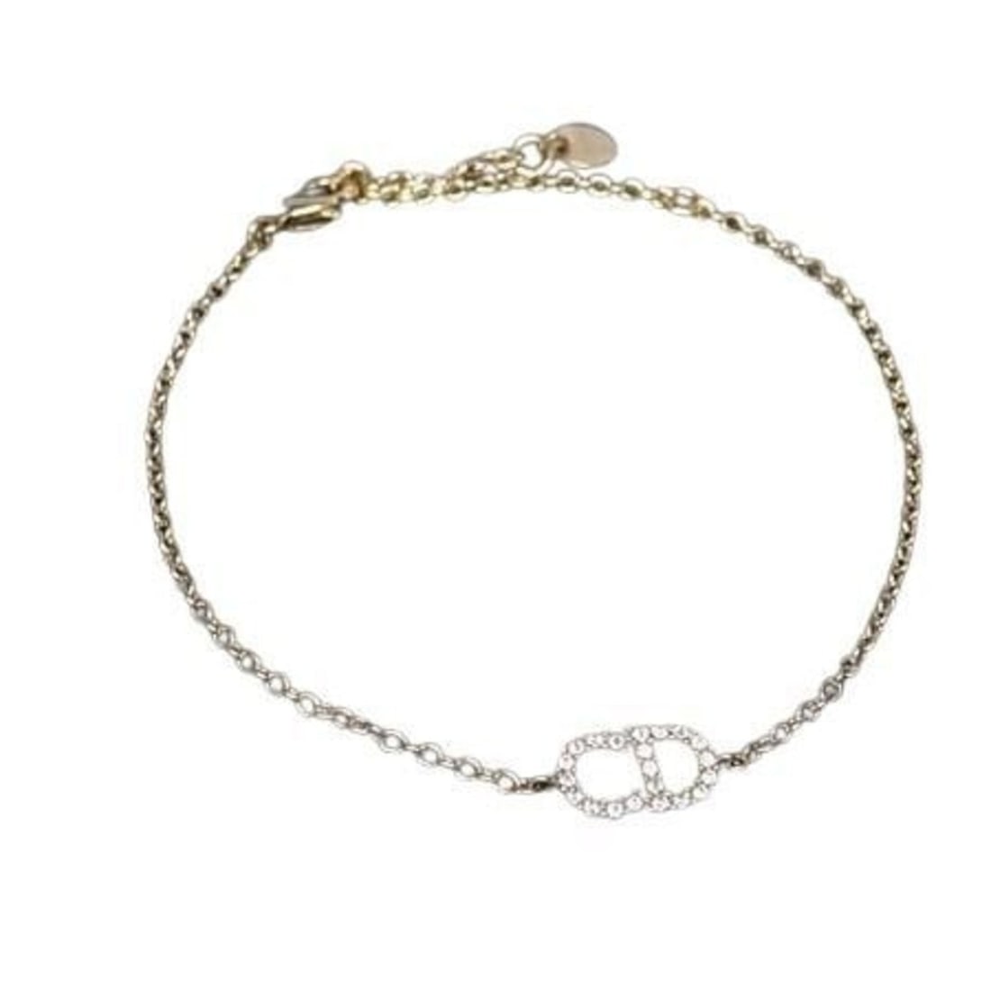 Christian Dior Clair D Lune Bracelet in Gold Metal with Rhinestones for Women: --- Catalog ---Category: SizeTotal Length: 22.5cm / 8.85''Category: DesignType: Charm braceletColor: GoldStone: RhinestoneGender: WomenMaterial: MetalCategory: GeneralBrand: Christian Dior--- Item Lis
