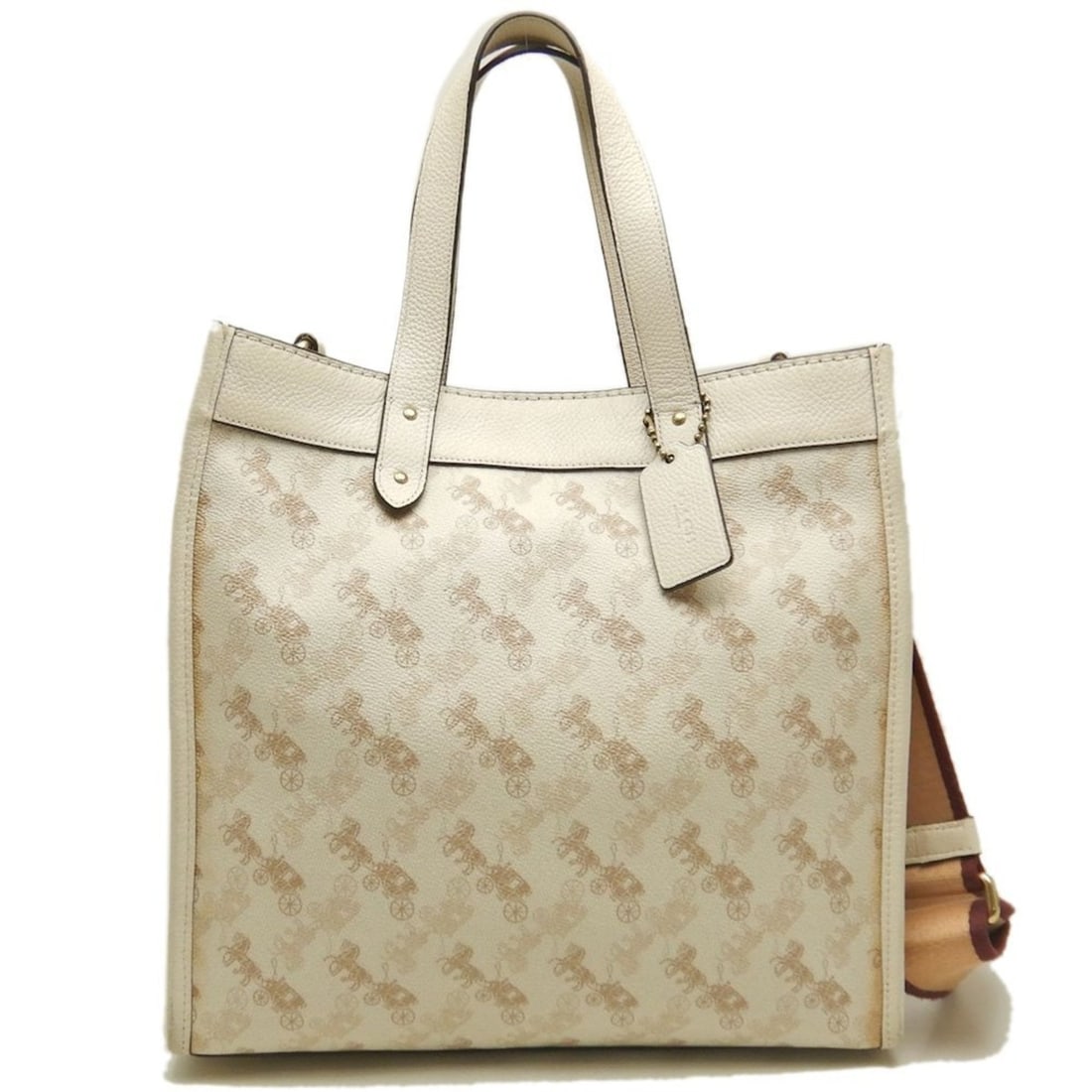 COACH Horse & Carriage Field Tote Bag 89143 in Coated Canvas and Leather, Ivory, Women's, 253582: --- Catalog ---Category: SizeSize (HxWxD): 29cm x 30cm x 15cm / 11.41'' x 11.81'' x 5.9''Strap Length: 88cm - 126cm / 34.64'' - 49.6''Category: DesignType: Shoulder bagColor: IvoryGender: WomenClosure
