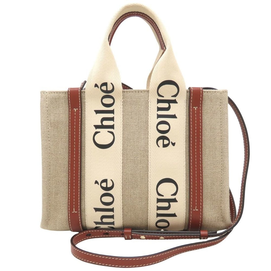 Chloé Chloe Woody Small Tote (CHC22AS397I2690U) Handbag in Linen and Calfskin, White Brown,: --- Catalog ---Category: SizeSize (HxWxD): 19cm x 26cm x 8.5cm / 7.48'' x 10.23'' x 3.34''Strap Length: 121.5cm / 47.83''Category: DesignType: HandbagColor: Brown, WhiteGender: WomenClosure: OpenMater
