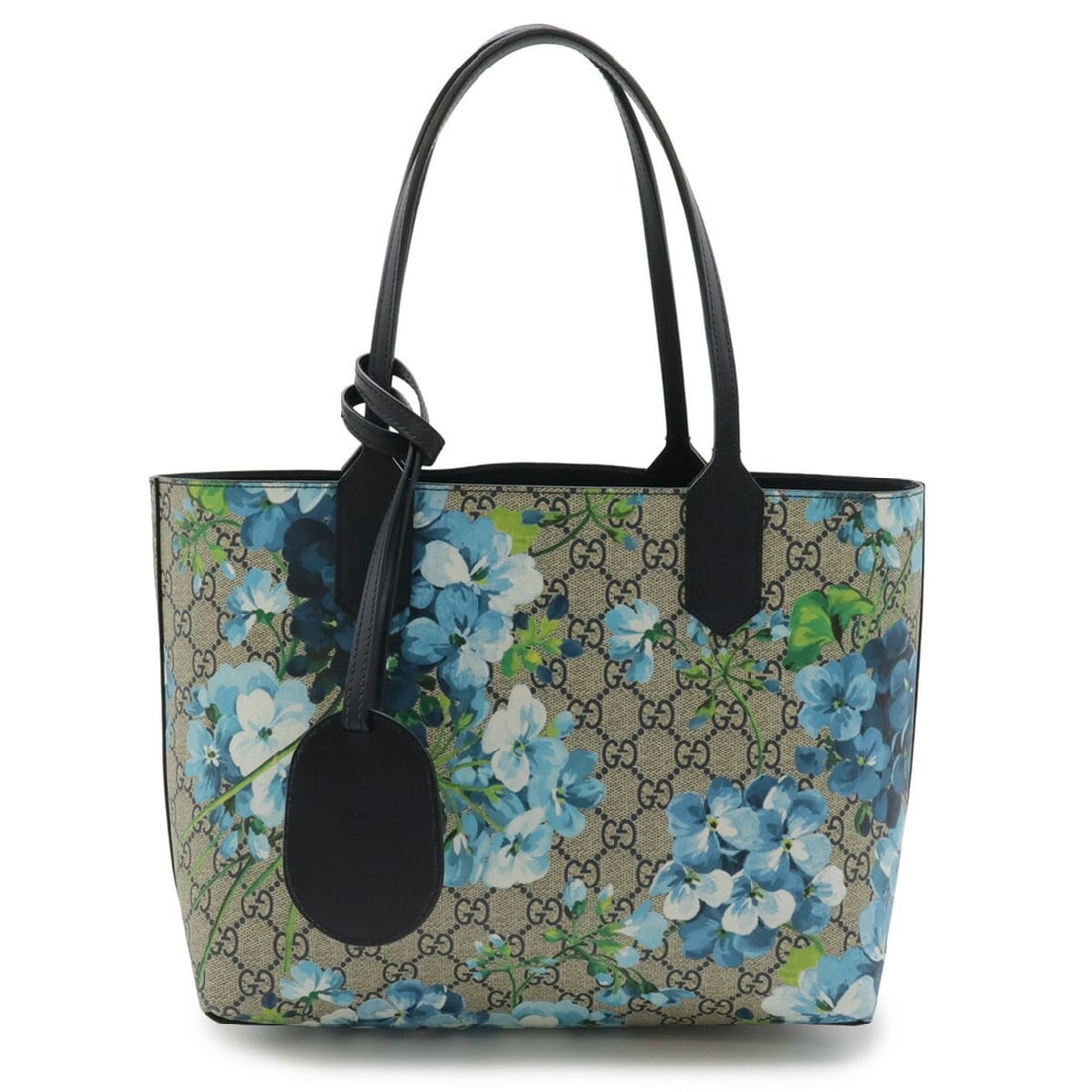 GUCCI GG Blooms Supreme Reversible Small Tote/Shoulder Bag in Beige and Blue Leather (546323): --- Catalog ---Category: SizeSize (HxWxD): 21.5cm x 11cm / 8.46'' x 4.33''Category: DesignType: Shoulder bag, Tote bagColor: Beige, Blue, Multi-color, Navy, WhiteGender: WomenMaterial: GG Supreme Cate