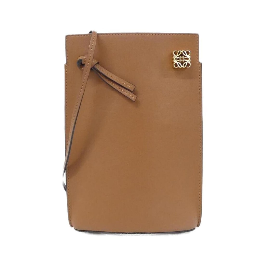 Loewe Dice Pocket C630R12X01 Shoulder Bag: --- Catalog ---Category: SizeSize (HxWxD): 20cm x 13cm x 4cm / 7.87'' x 5.11'' x 1.57''Category: DesignType: Shoulder bagColor: BrownGender: WomenMaterial: Leather Hardware Color: GoldLeather/Fur Type