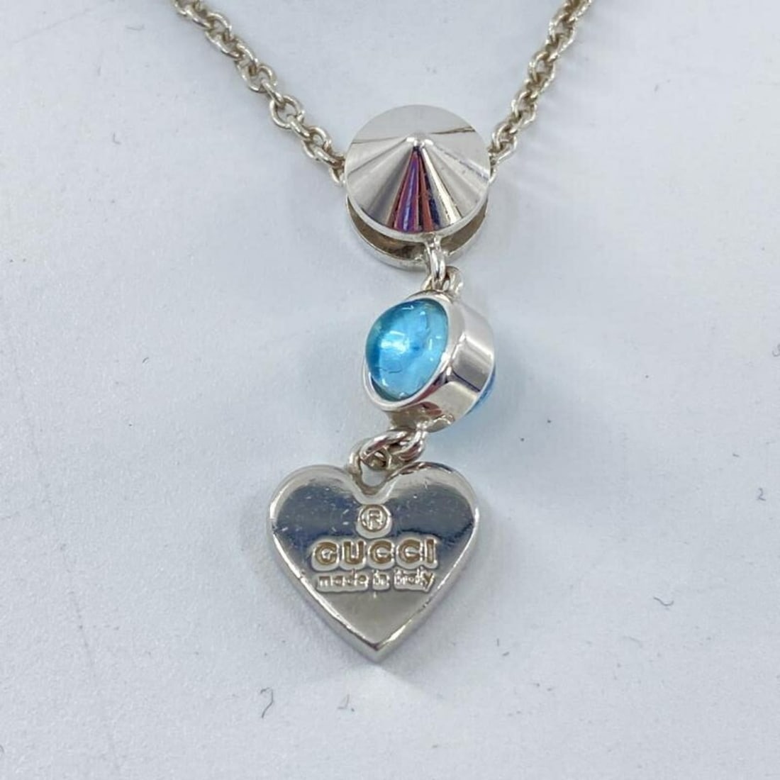 GUCCI Blue Crystal Heart Necklace in Silver (Ag925): --- Catalog ---Category: SizePendant Size: 2.5mm x 1mm / 0.09'' x 0.03''Neck Circumference: 41 cm / 16.14''Category: DesignColor: SilverGender: WomenNecklace Type: NecklaceCategory: GeneralBrand: Gucc