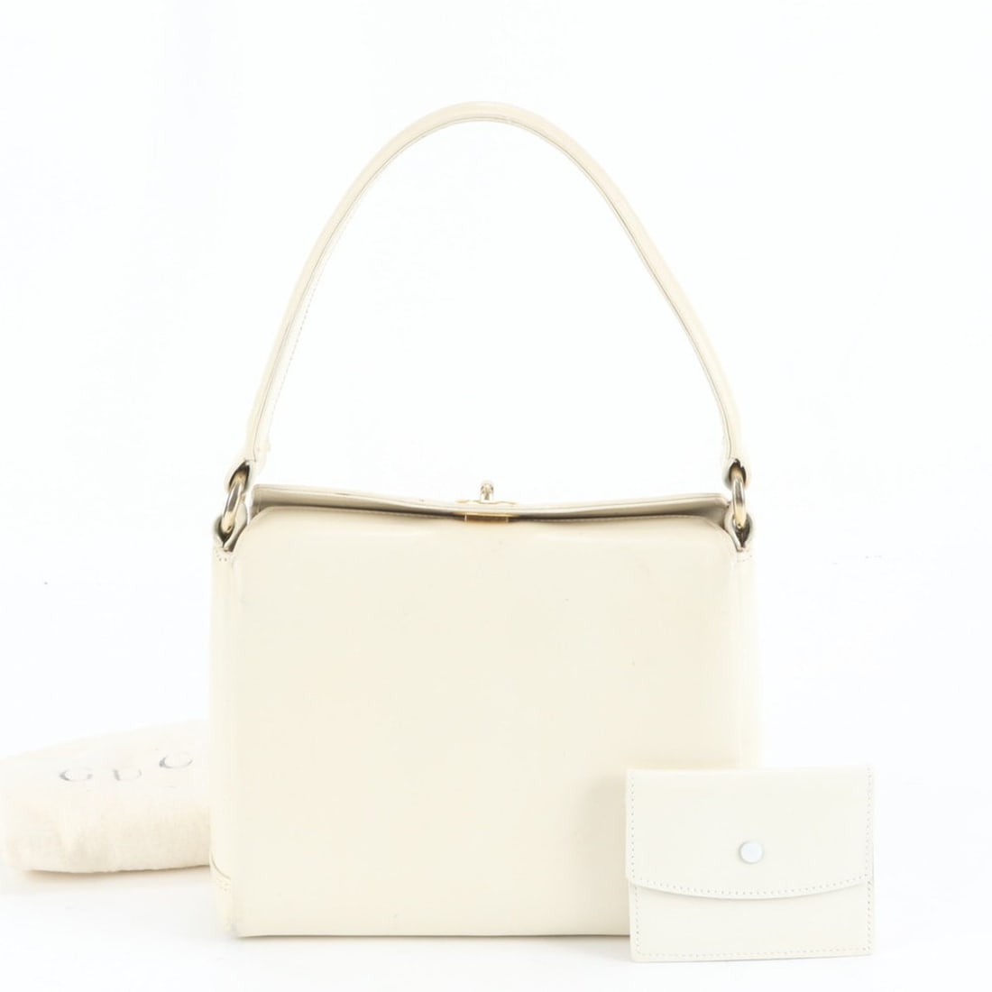 Gucci Old Turnlock Leather Handbag White Women's: --- Catalog ---Category: SizeSize (HxWxD): 18cm x 22cm x 9cm / 7.08'' x 8.66'' x 3.54''Handle Length: 43cm / 16.92''Category: DesignType: HandbagColor: Ivory, WhiteGender: WomenClosure: Turn